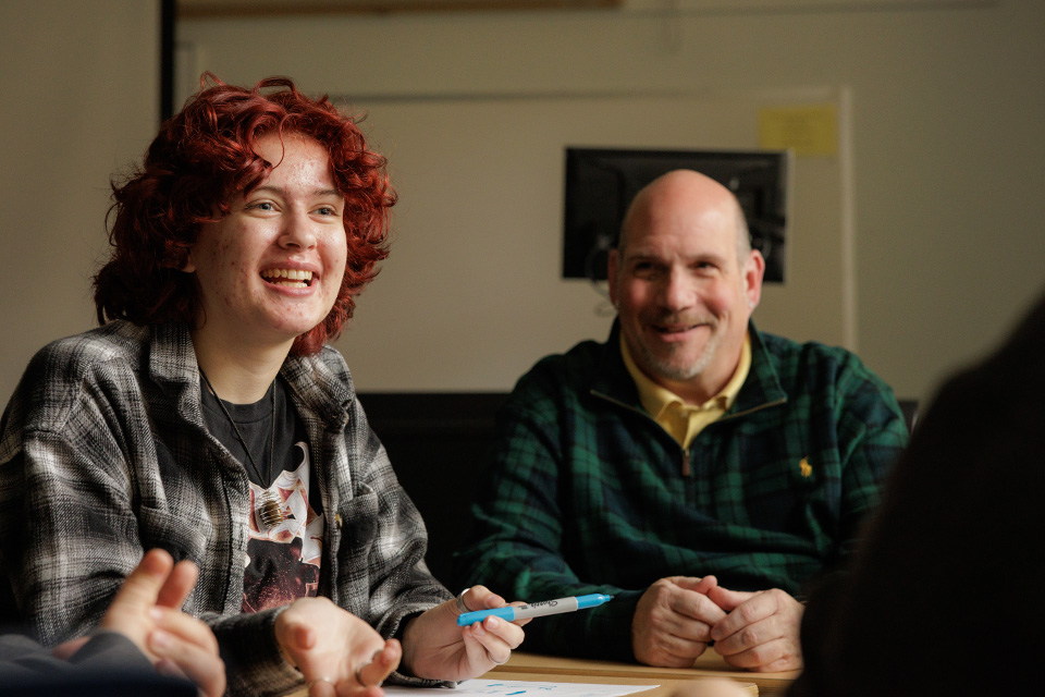 student and professor working together