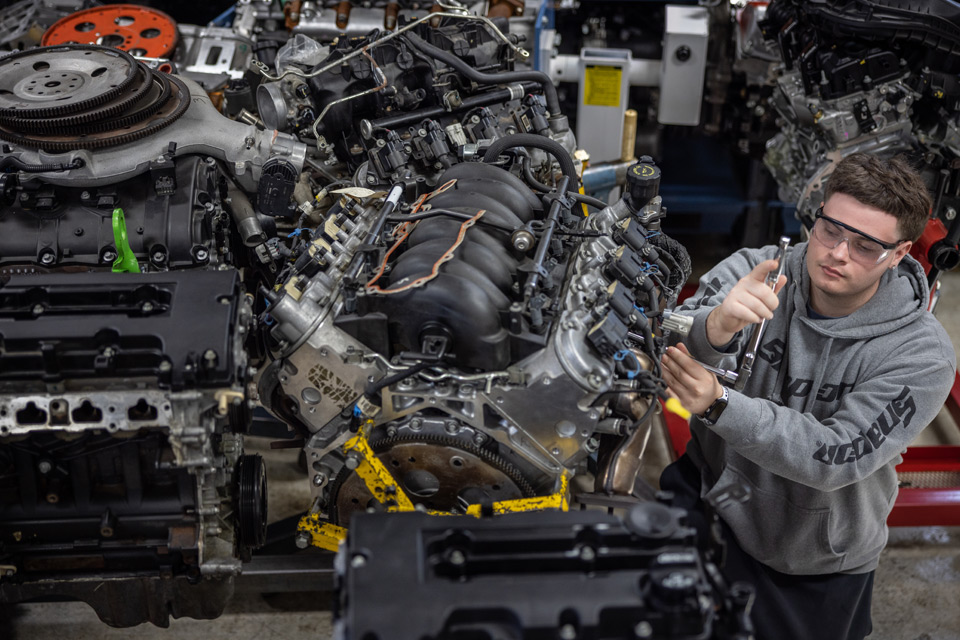 student working in auto shop