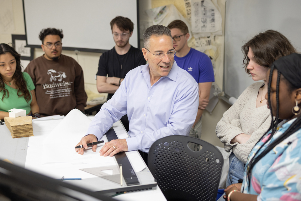 professor instructing his students