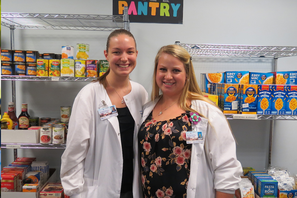 students working at the food pantry