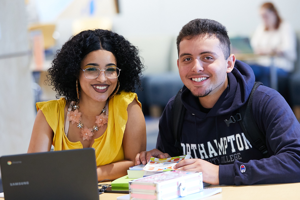 Students working at laptop