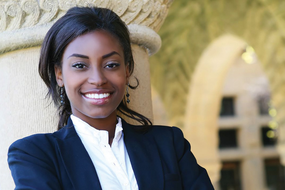 Black female student wearing a suit ready for an interview