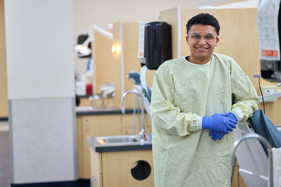 Diverse Male Student in Dental Lab