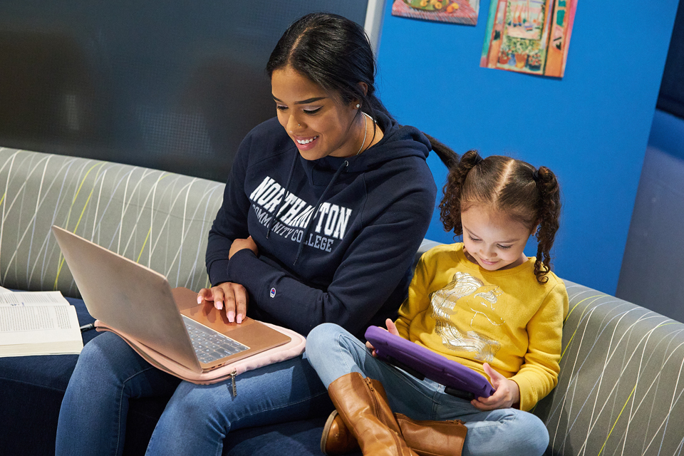 online student and her daughter