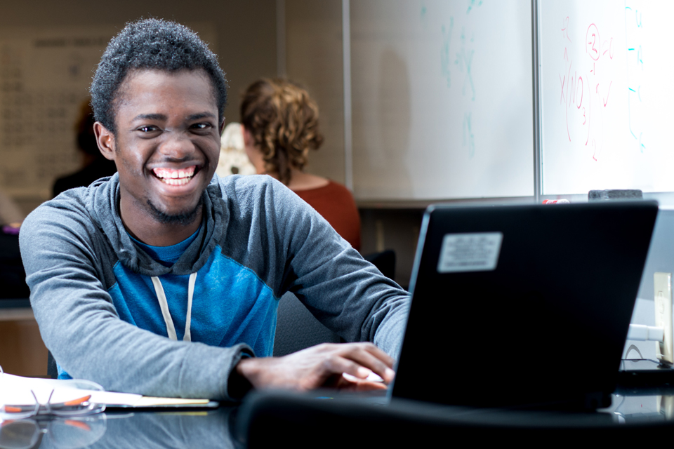 student at laptop