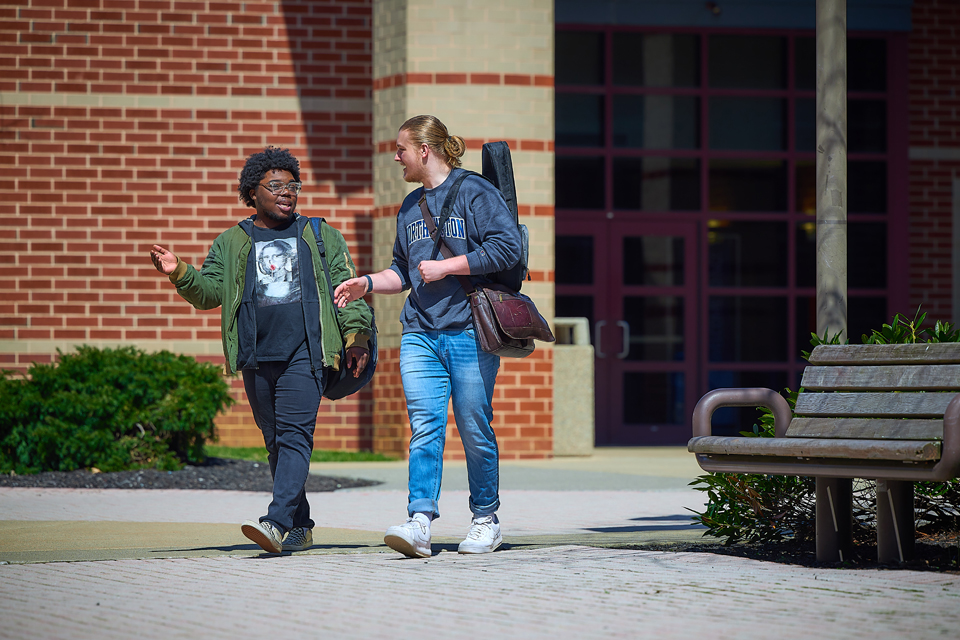 students walking on campus