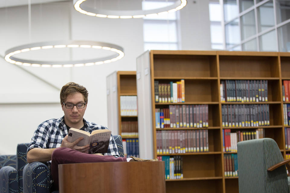 Student in Monroe Library