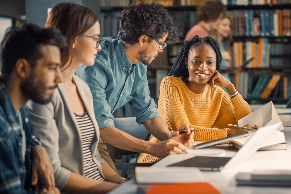 Students sitting at a library table