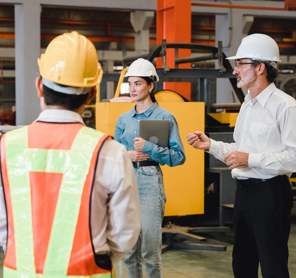 Man in construction outift leading a safety training