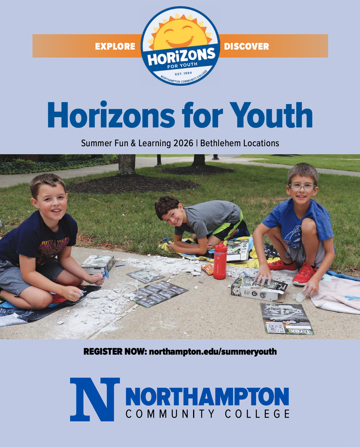 children playing with sidewalk chalk smiling