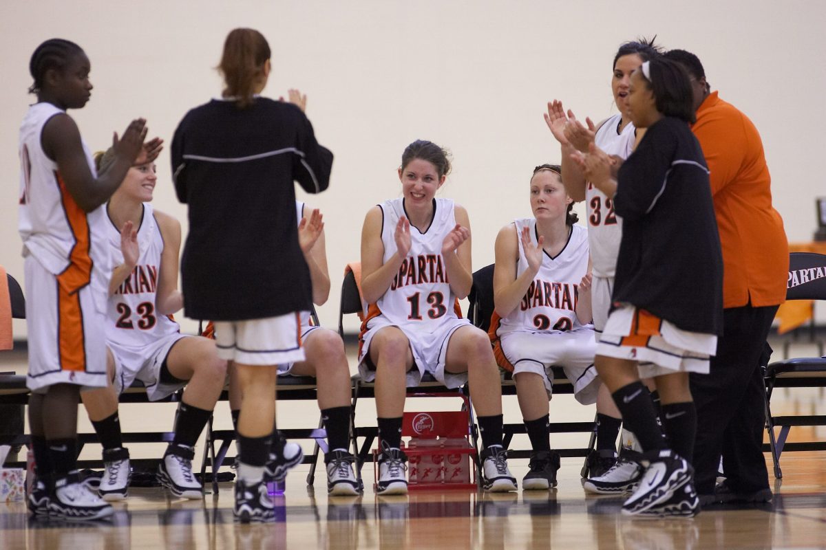 NCC Girls Basketball players on bench