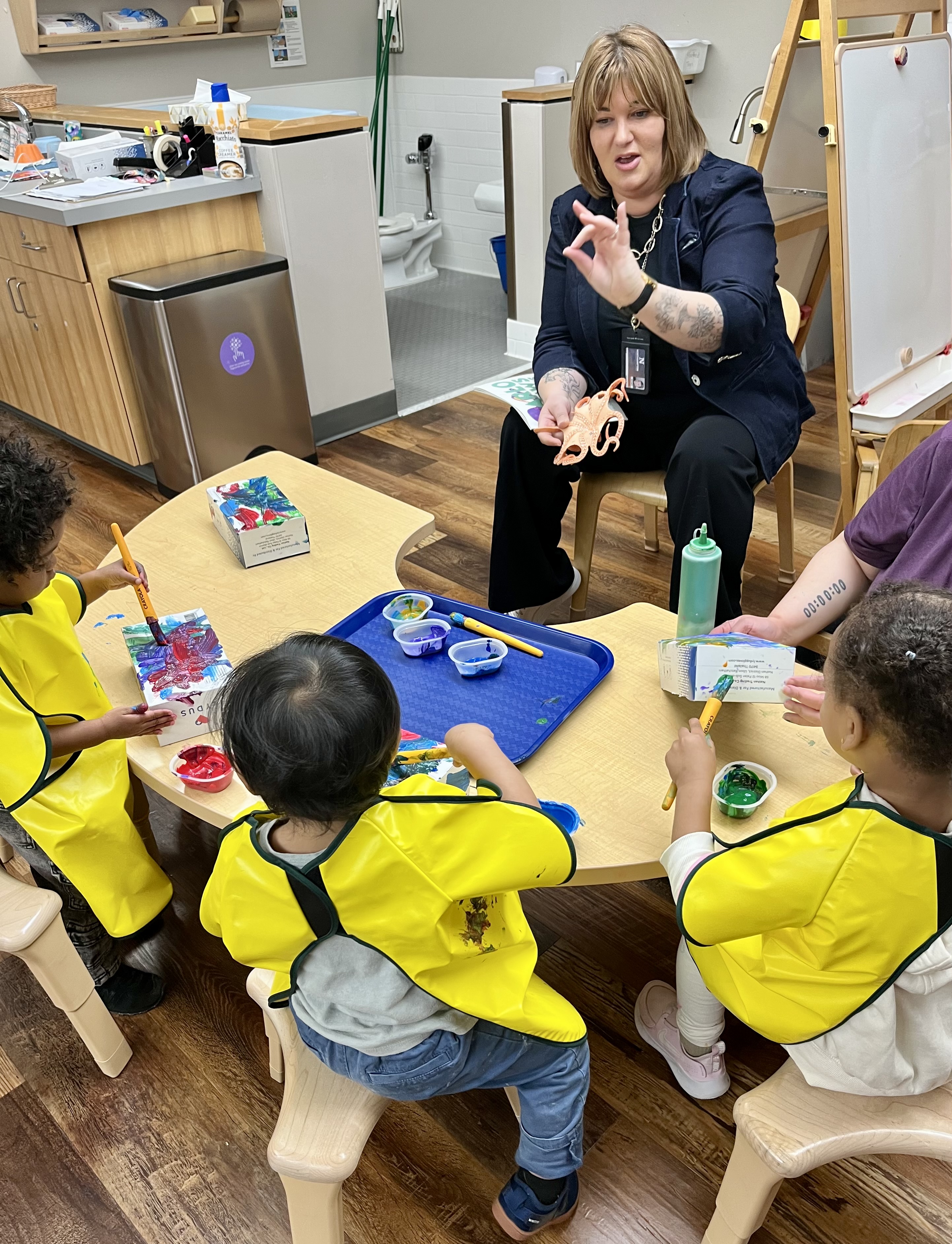 Breech reading to children at Hannig Children's Center during Week of the Young Child