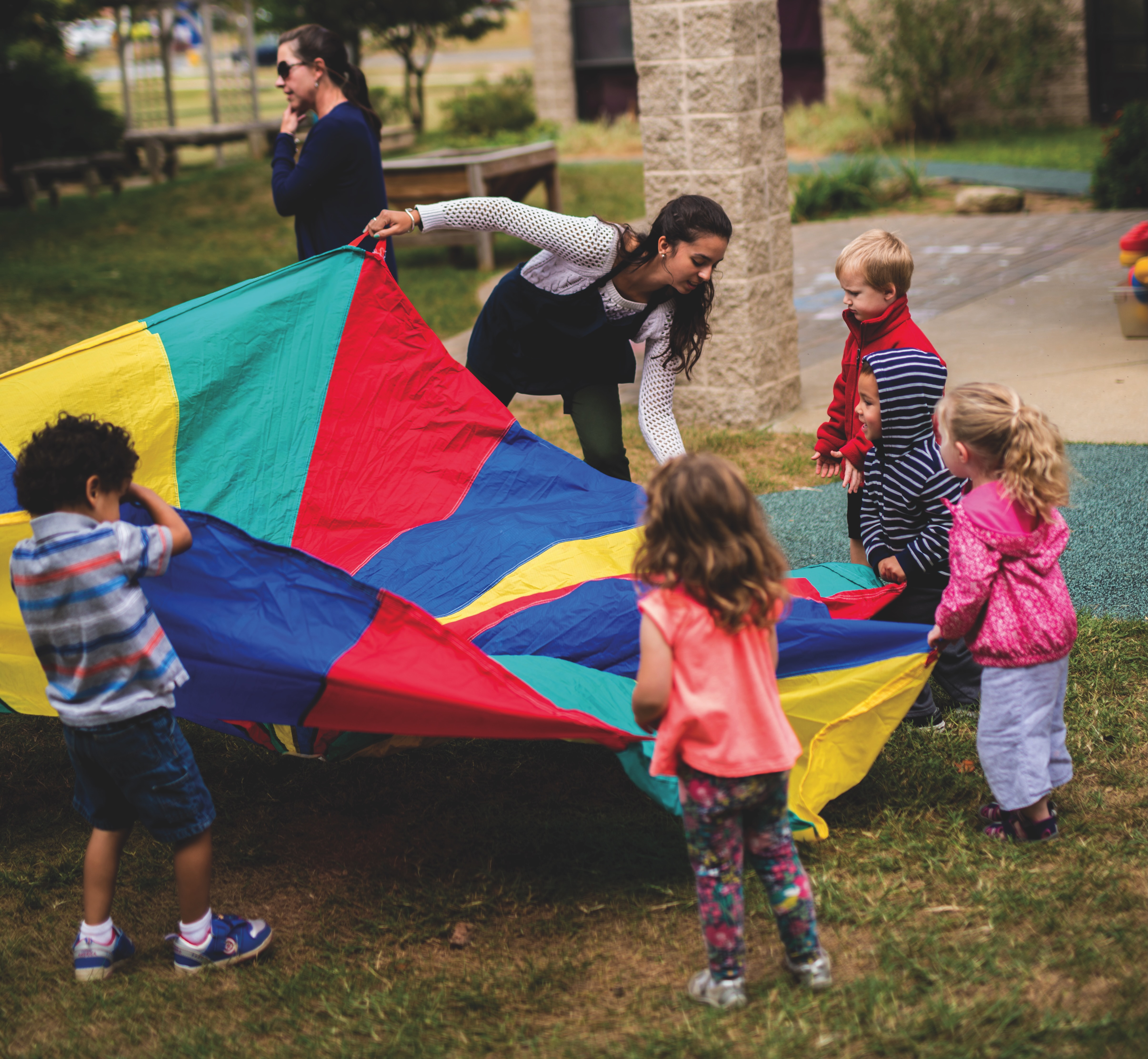 Outside Reibman Hall on Bethlehem campus; kids play