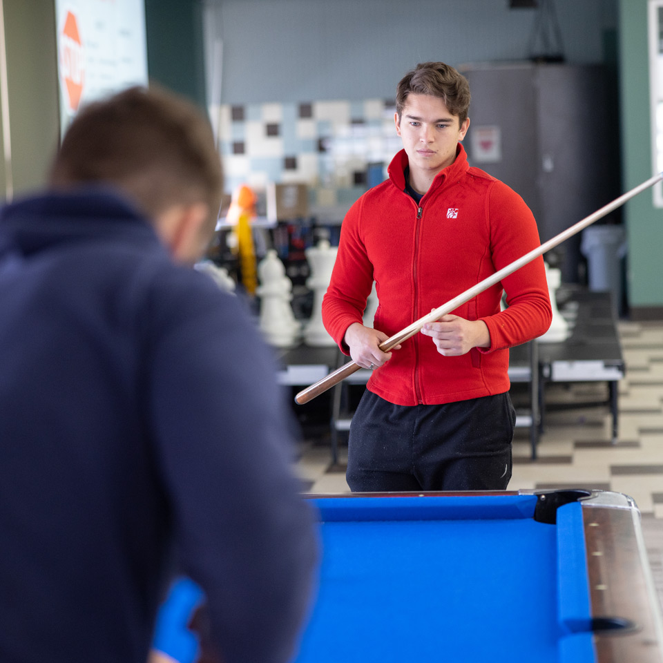 Students playing pool